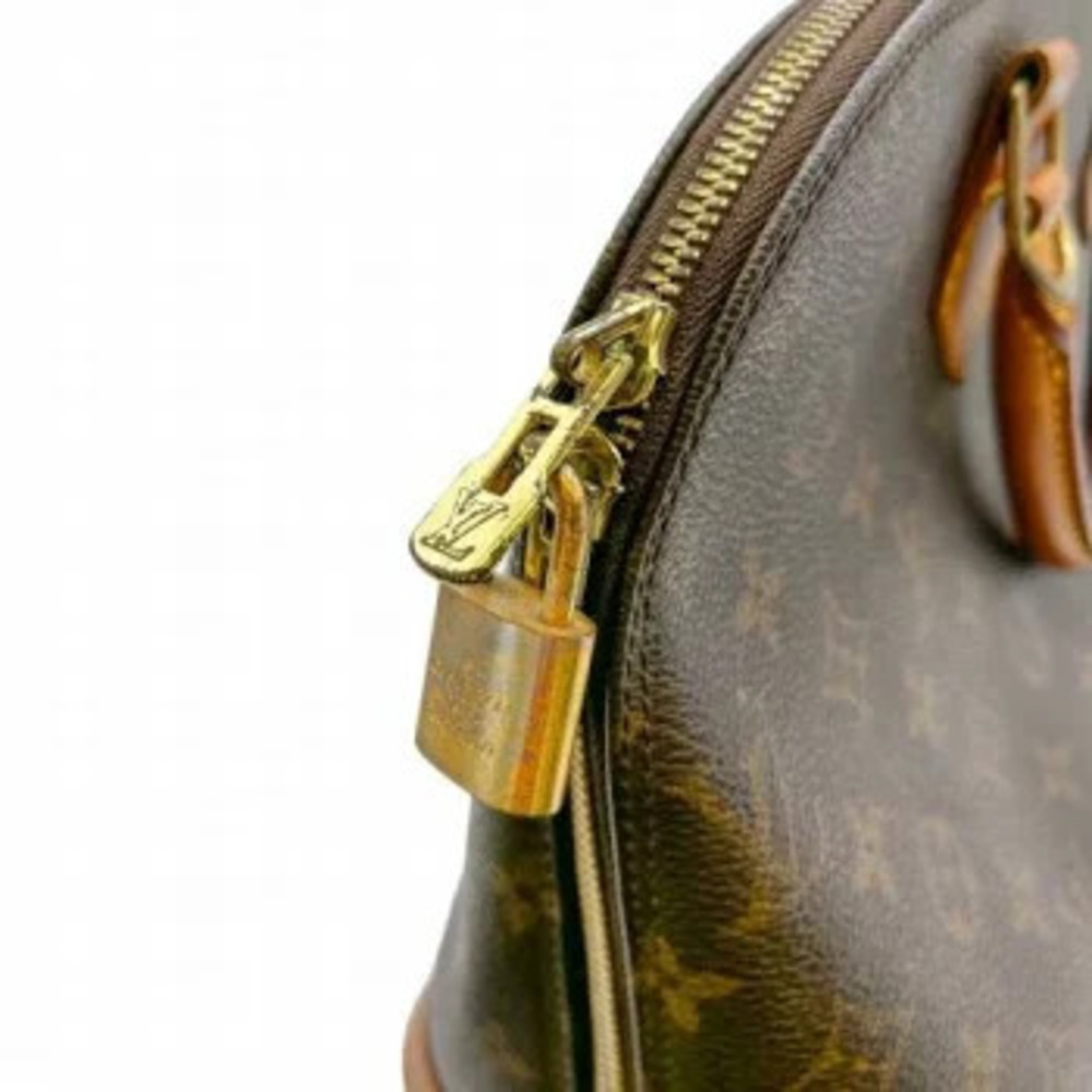 Louis Vuitton Alma Monogram Handbag - Picture 7 of 10